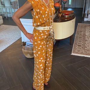 Gold silk jumpsuit made in Italy.